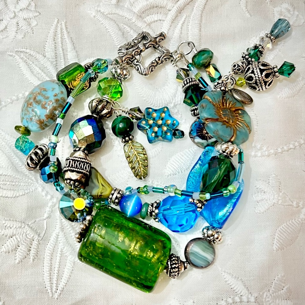 Chunky three-strand bracelet. Handmade boho style blues & greens, primo quality.